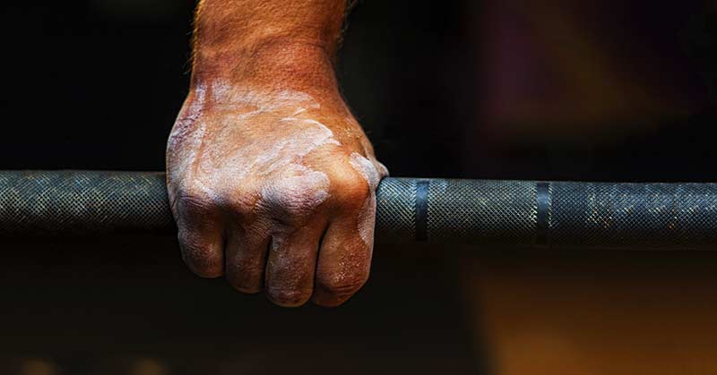 Weight Lifter Hand on Barbell