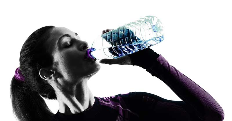 Athlete Drinks Water for Recovery