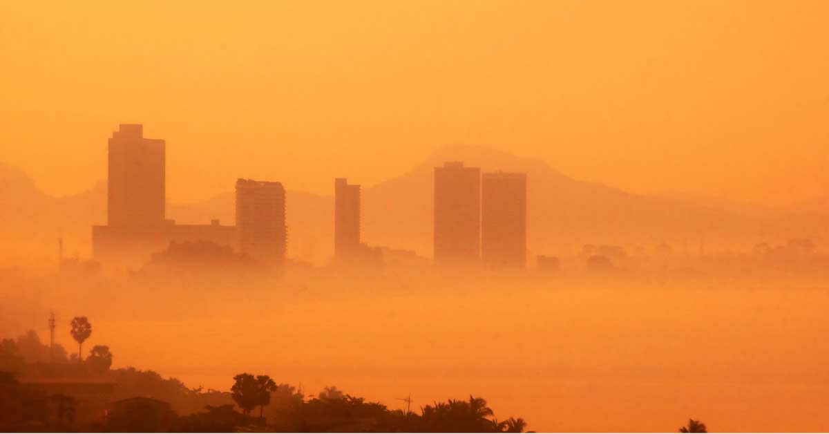 Orange smog coats downtown Los Angeles