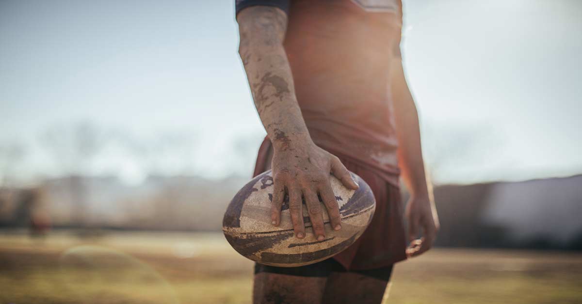 Rugby Player Holding Rugby Ball
