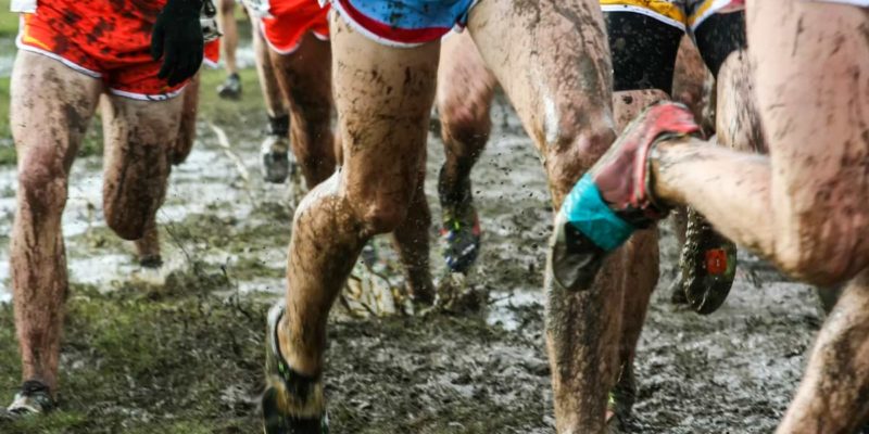 Muddy Cross Country Runner