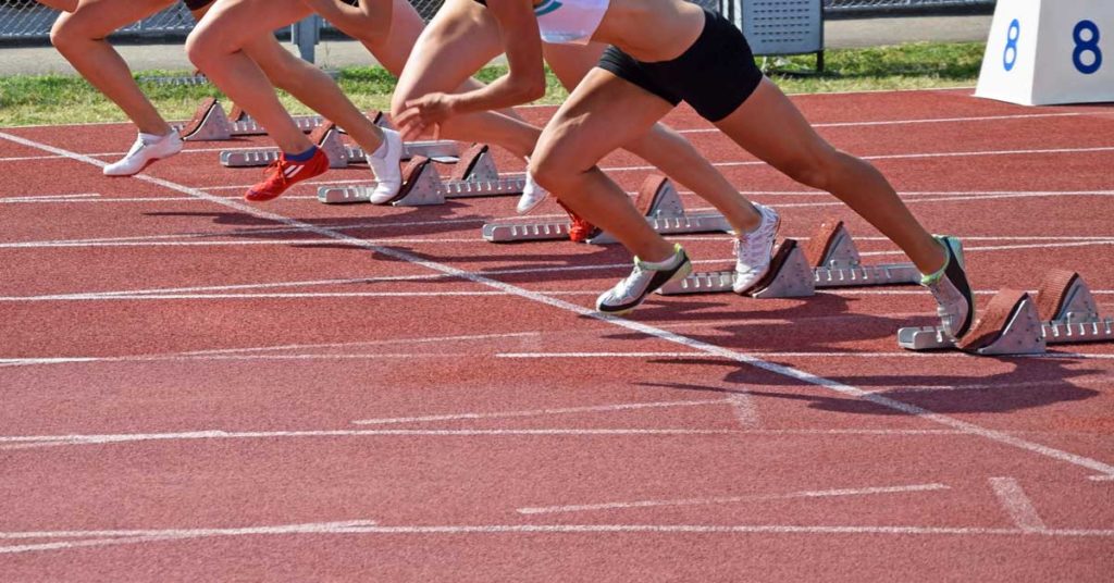Female Sprinters Block Start