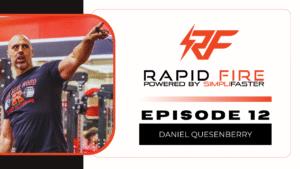 A muscular man with a beard in a gym points. The text beside him reads Rapid Fire Powered by SimpliFaster, Episode 12, Daniel Quesenberry. A red and black RF logo is above the text.