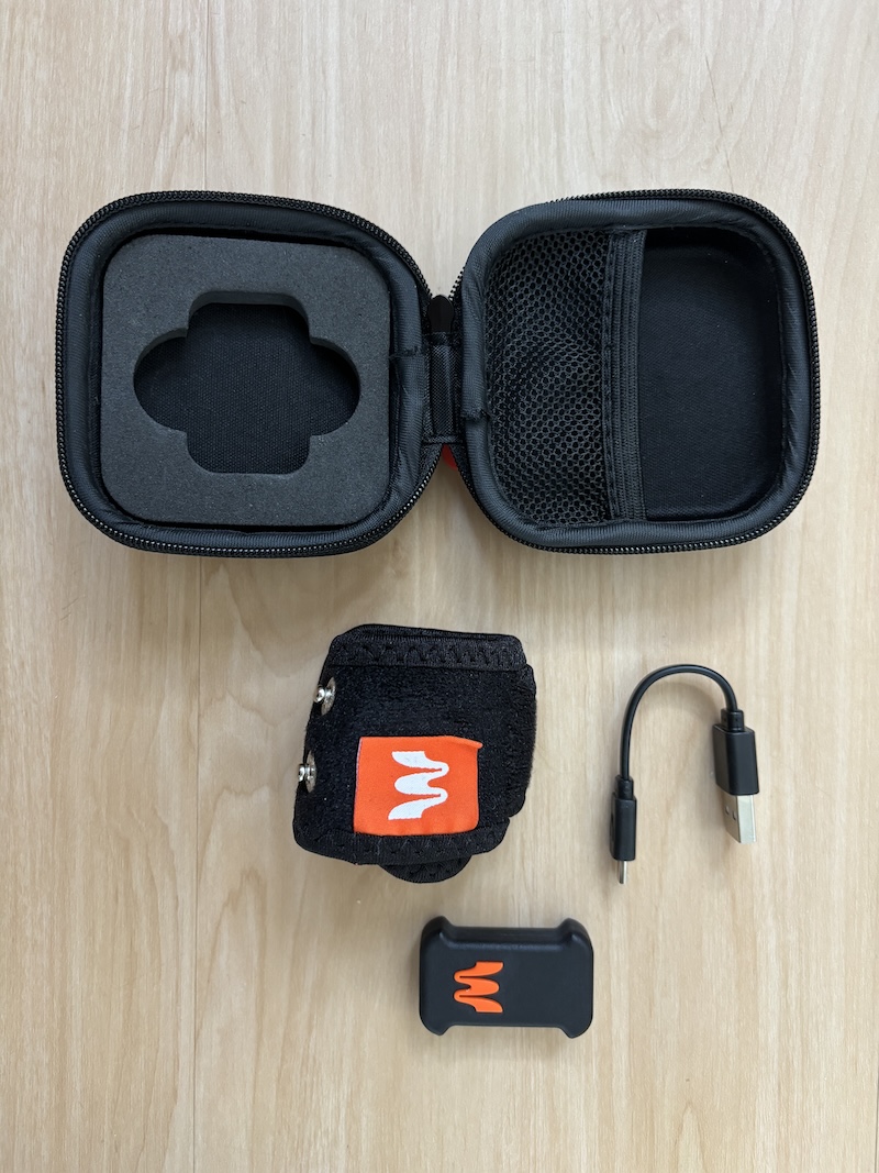 Everything that comes in the box, including a travel case, barbell strap, charging cable, and the Enode sensor.