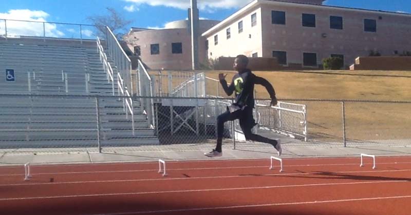 Athlete Sprinting Over Speed Hurdles in the Wicket Drill|Basic Wicket Drill|Wicket Drill Settings|Wicket Drill Spacings|Complexed Wickets|Two athletes are captured mid-air while jumping over hurdles on a track. The image is split vertically