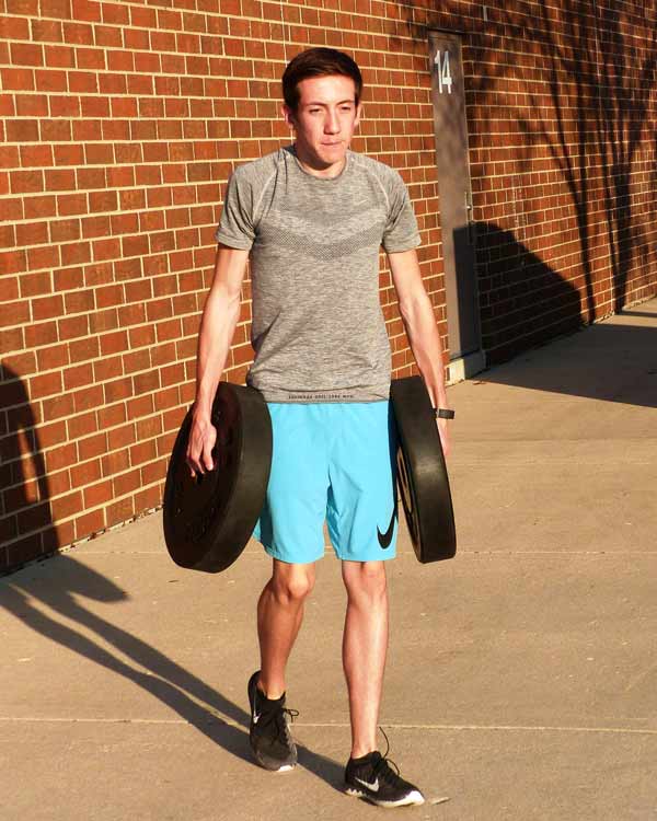 Distance Runner Carrying Weights