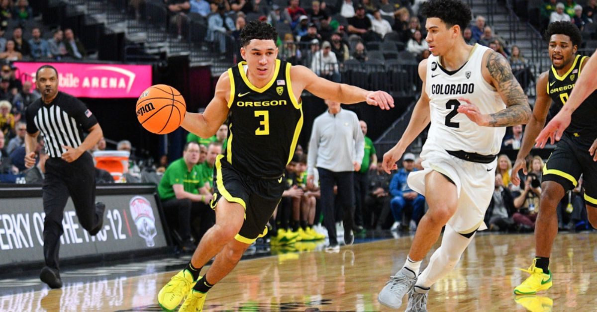 Two basketball players in action during a game