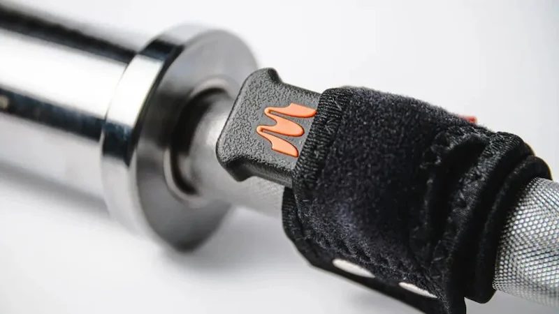 The Enode VmaxPro inside its barbell sleeve on a barbell.
