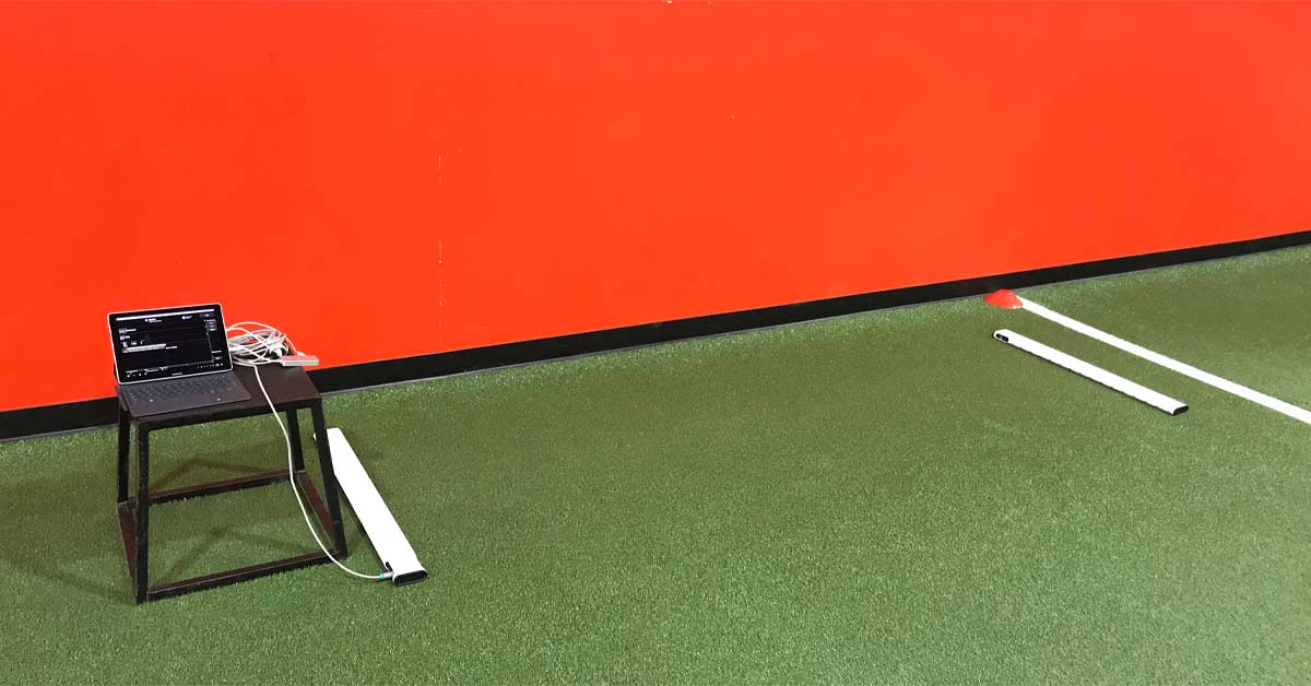 Ergotest|ML Product|MuscleLab screenshot|Three images show athletes involved in various sports training. The first image shows an athlete jumping over hurdles indoors. The second image depicts an athlete practicing starts on an indoor track. The third image shows weightlifting near a laptop.|ML Product Line|MuscleLab in Use