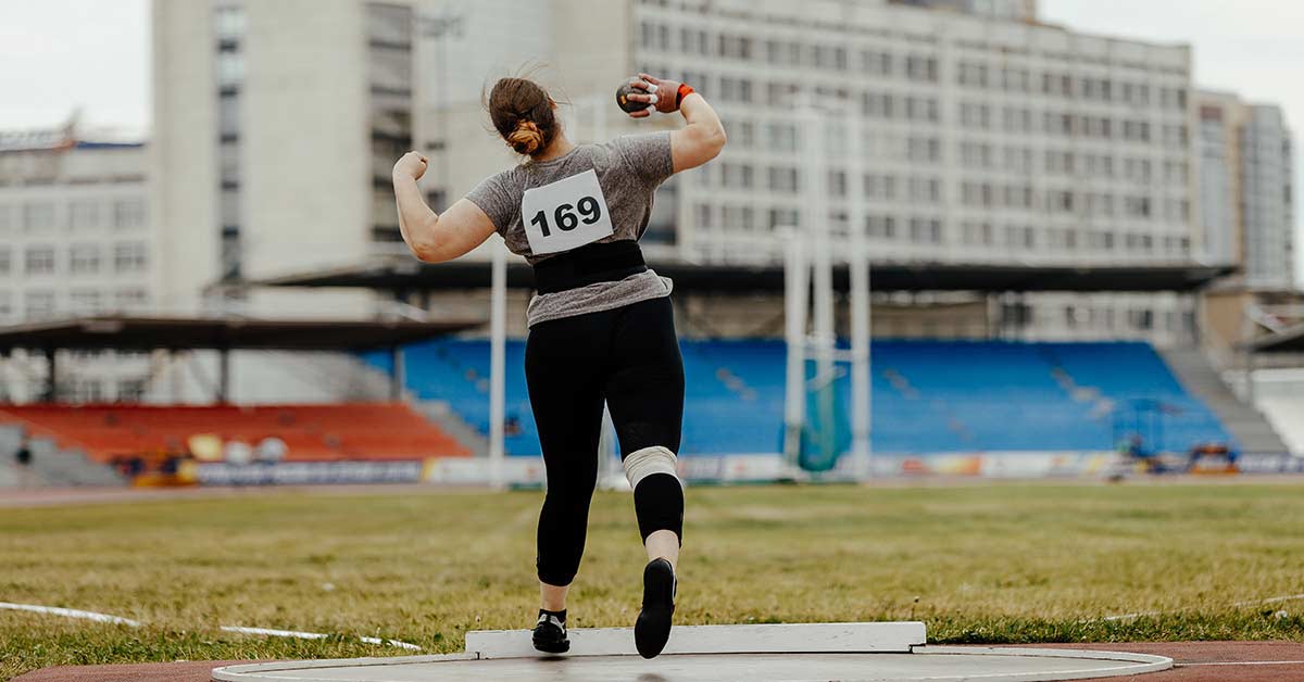 Female Shot Put|Aikens Video Analysis|Two images show a person practicing discus throwing. Text describes techniques: maintaining alignment