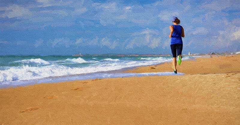 Female Runner on Beach