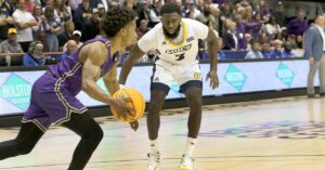 Furman Basketball|A slide titled Action Points with a blue arrow pointing right. It discusses replicating total game day demands