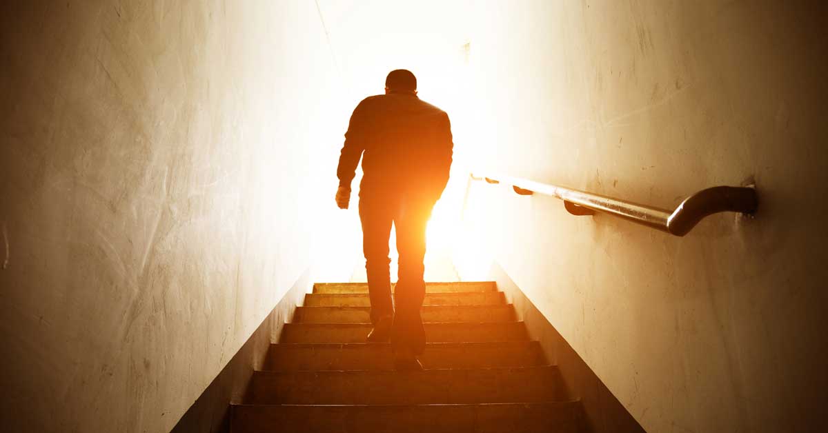 Man Walking Up Stairs