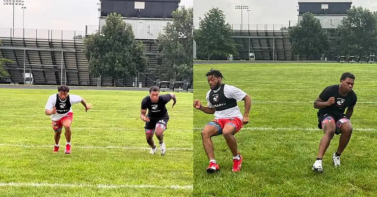 McCloyd GPS COD|200m GPS|Segment GPS|GPD Drive Phase|COD Average|COD Improved|GPS Gamify Training|Two people are mid-sprint on a grassy field wearing training vests. They appear focused on their activity