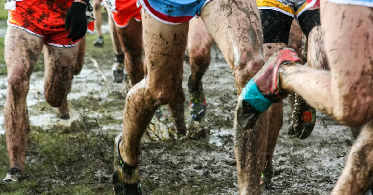 Muddy Cross Country Runner