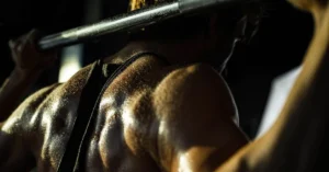 Strength vs Power|The Enode VmaxPro inside its barbell sleeve on a barbell.