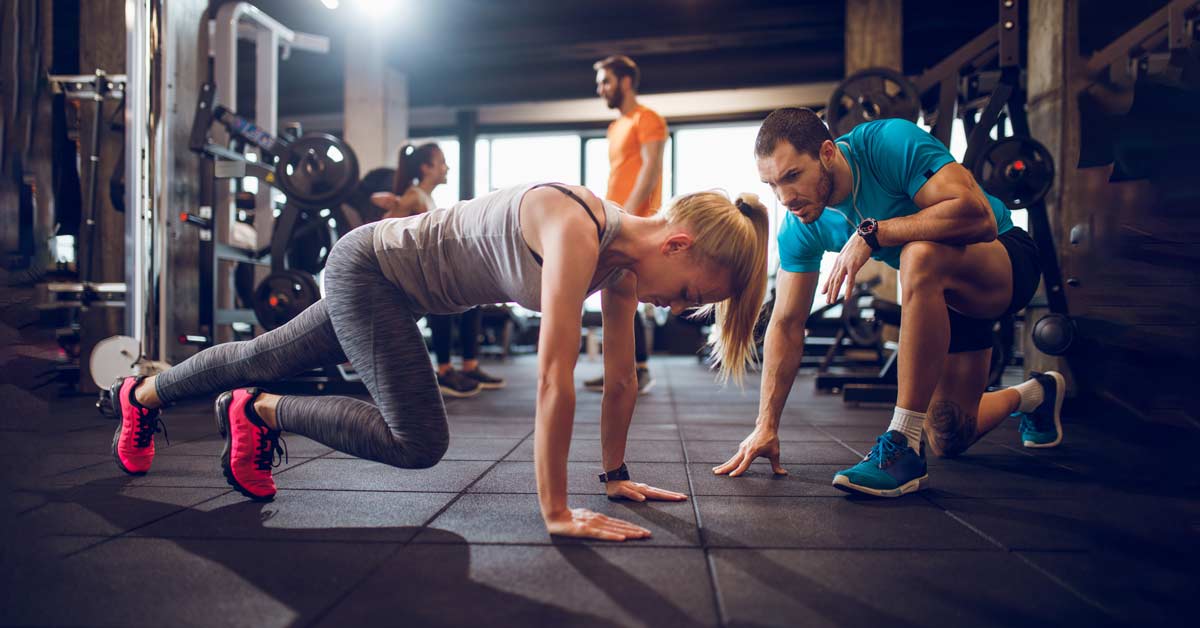 Personal Trainer with Female Client