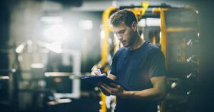 Personal Trainer With Clipboard