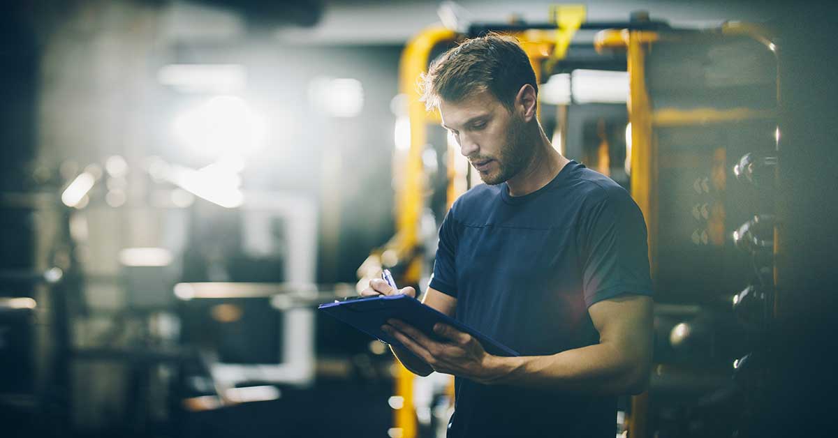 Personal Trainer With Clipboard