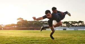 Rugby Tackle|A performance metrics table for Loose Forward and Wing positions
