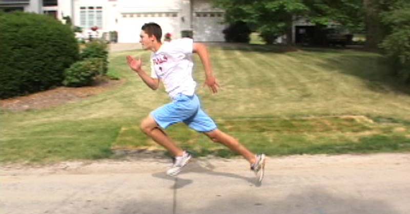 Runner Has Long Leg in Back