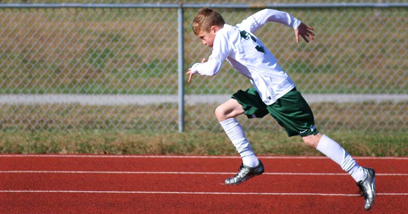 Sprint Acceleration Drill|Distance Runners|Three sprinters in motion during a track race
