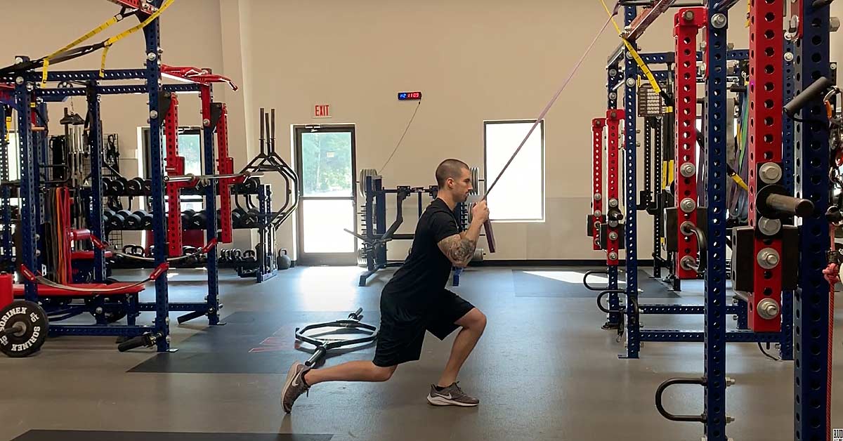 Tightness Stretching|Tightness Massage|A person in athletic wear performs a side stretch in a gym. On the left