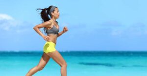 Woman Exercising on the Beach