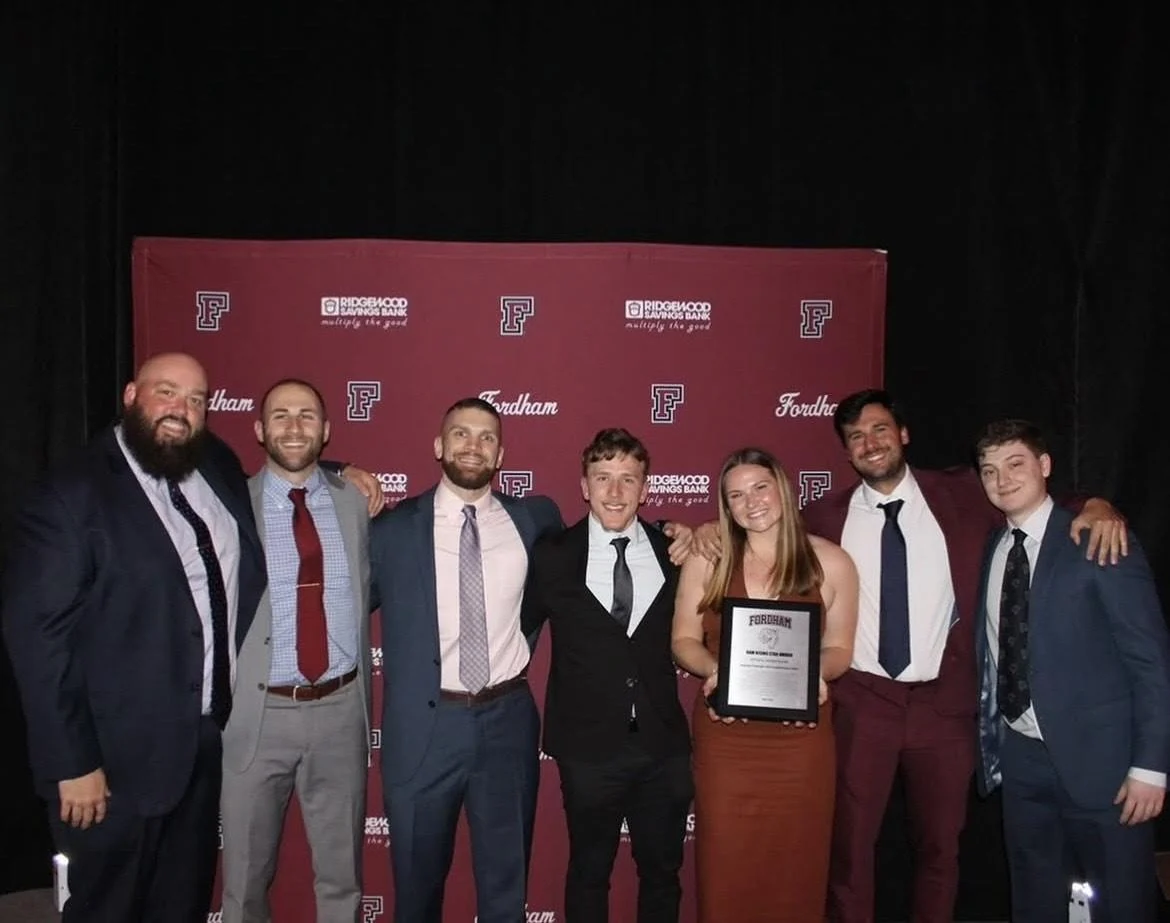 A group of people posing for a photo Description automatically generated