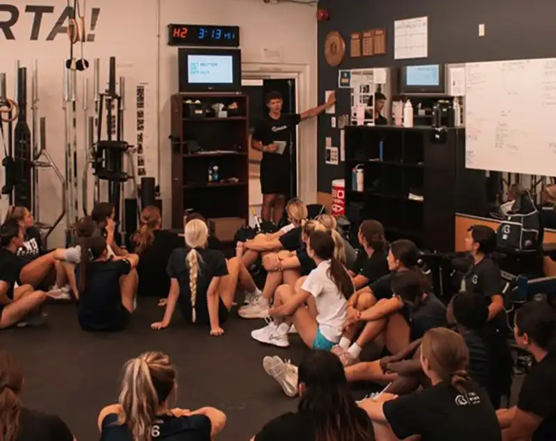 Cole Hergott talks with athletes