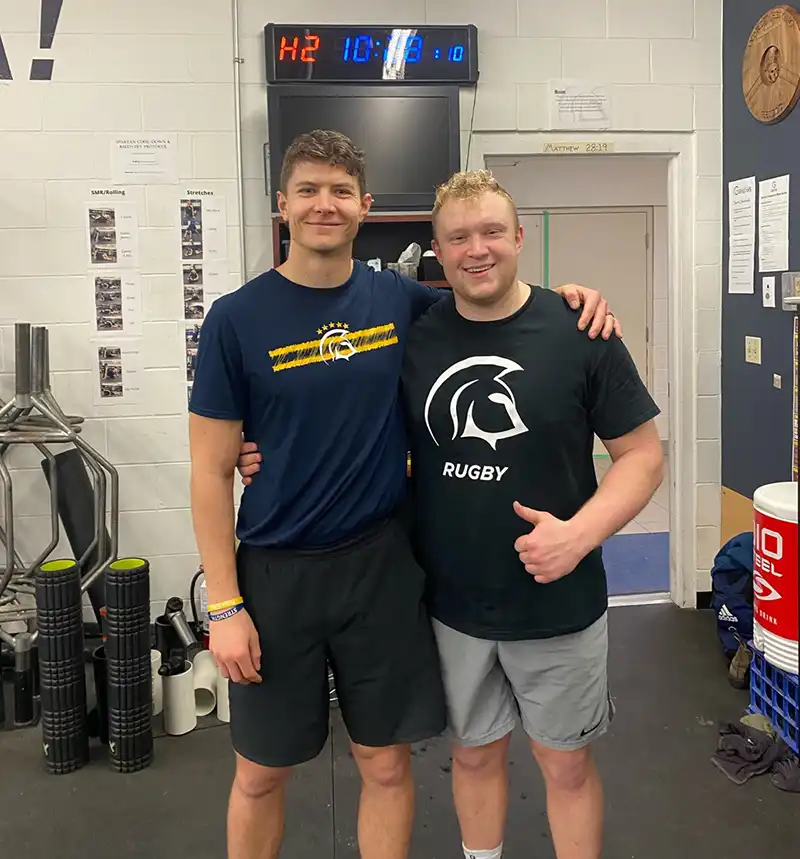 Cole Hergott with Coach