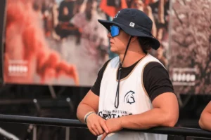 Cole Hergott watches athletes during a Trinity Western training or competition session.